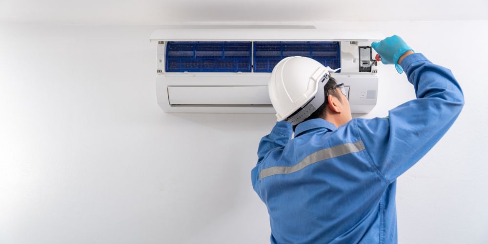 Pourquoi choisir un artisan RGE pour installer un climatiseur réversible ?